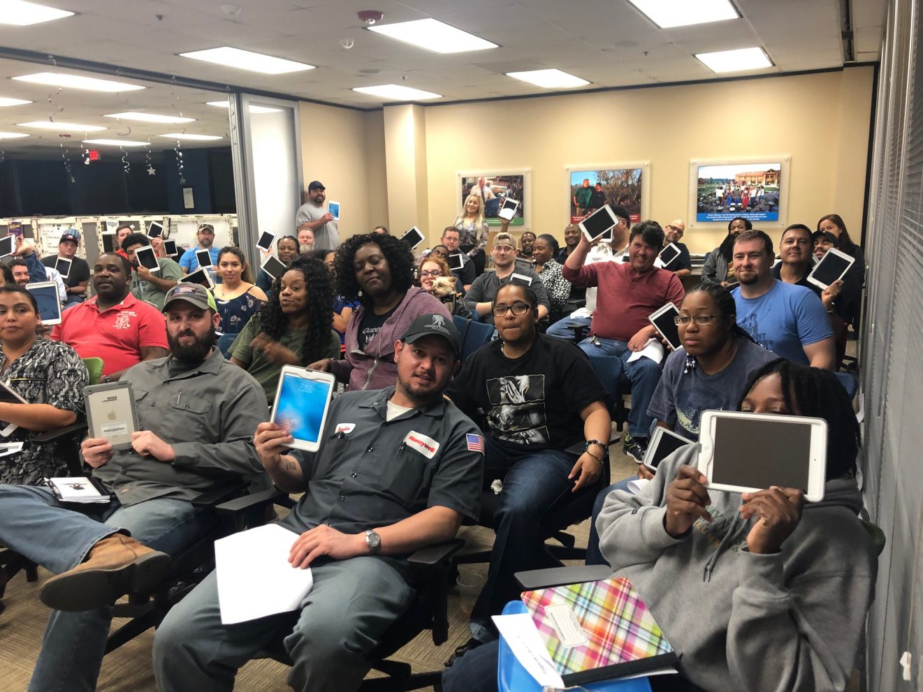 group of veterans with iPads