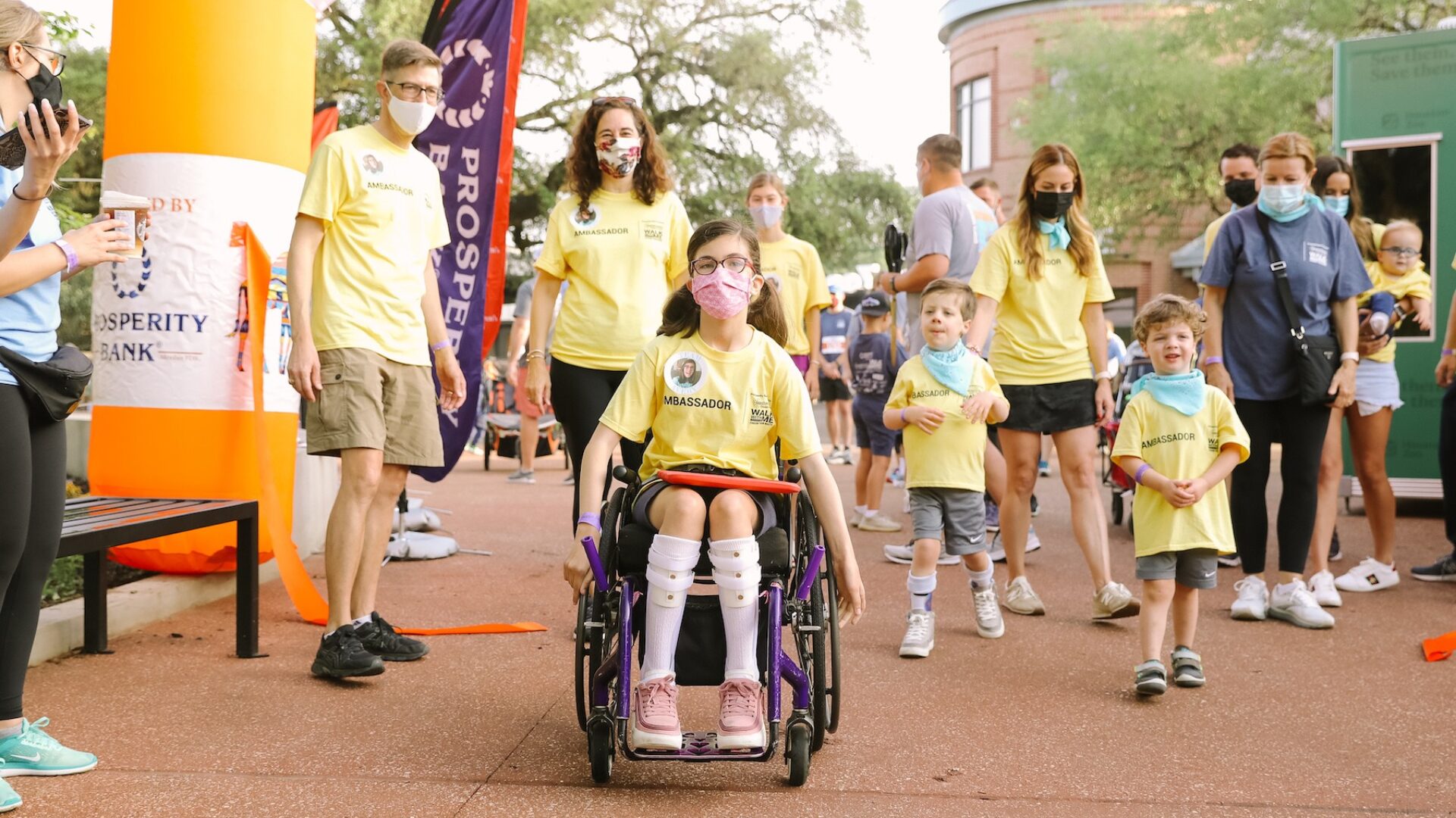 girl in wheelchair with ipad in lap