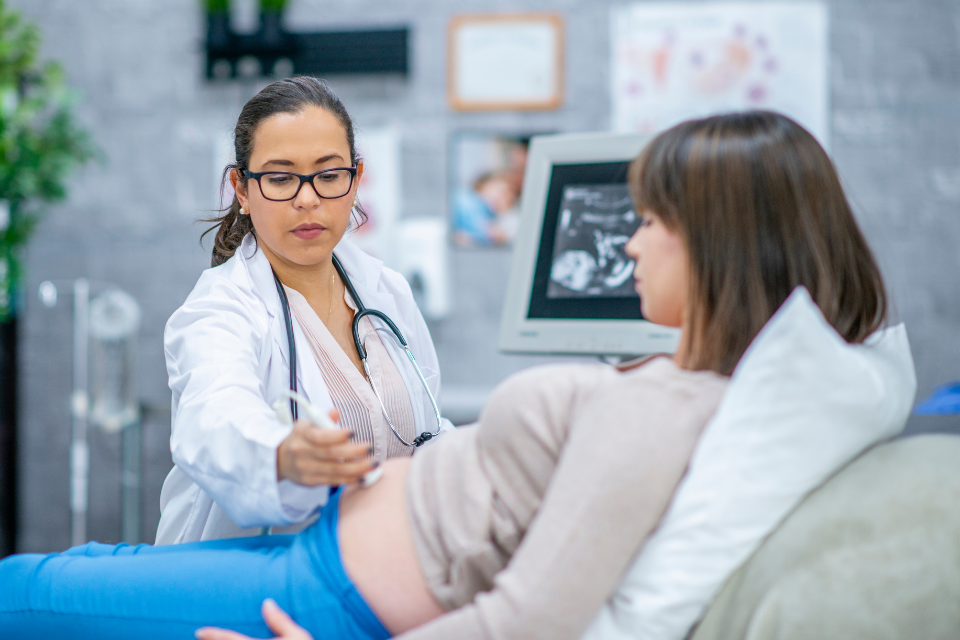 pregnant mom having ultrasound of belly