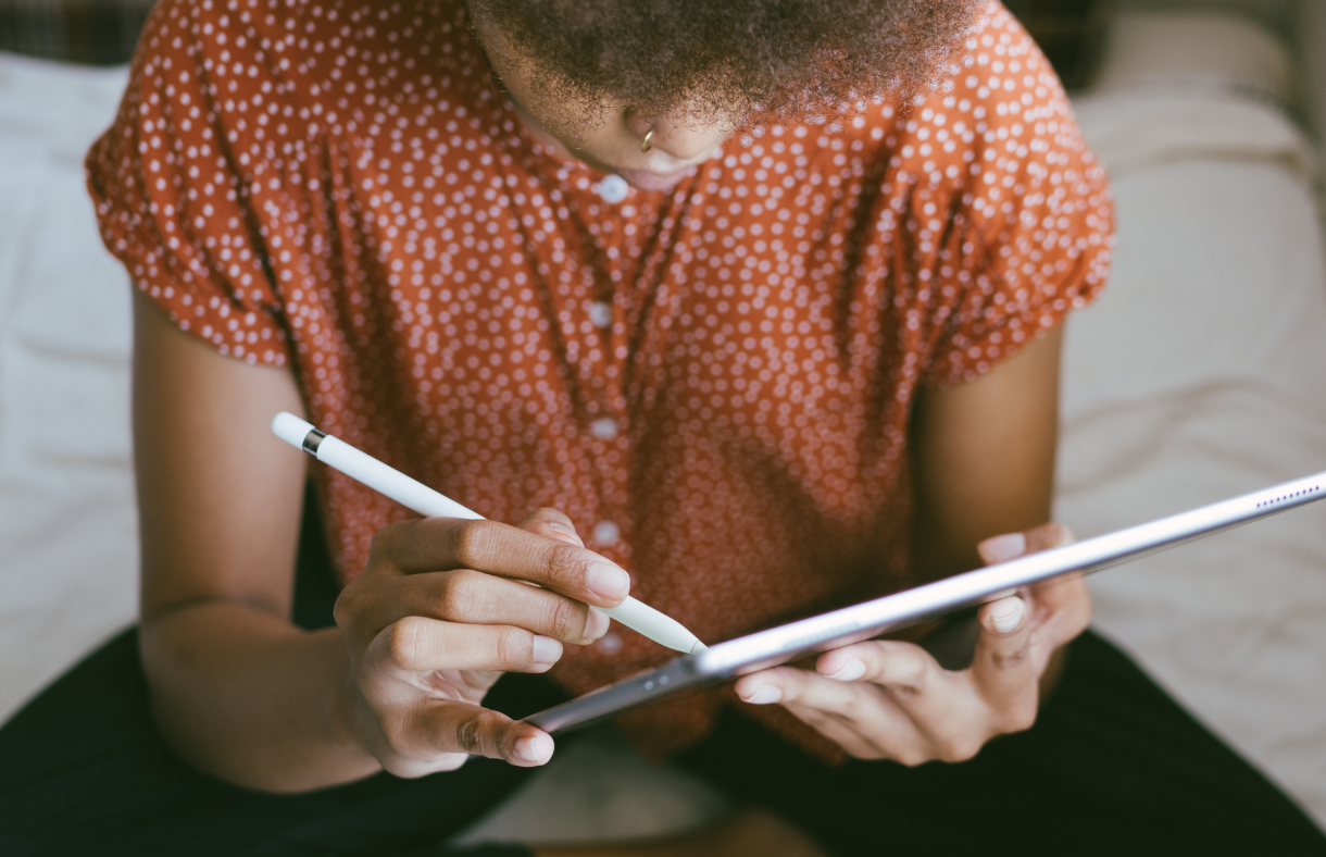 young adult female using ipad