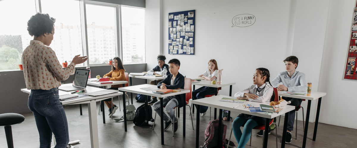 teacher at front of class