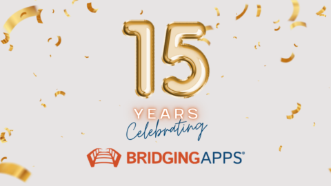 graphic with gold balloons and confetti that reads 15 years celebrating bridgingapps